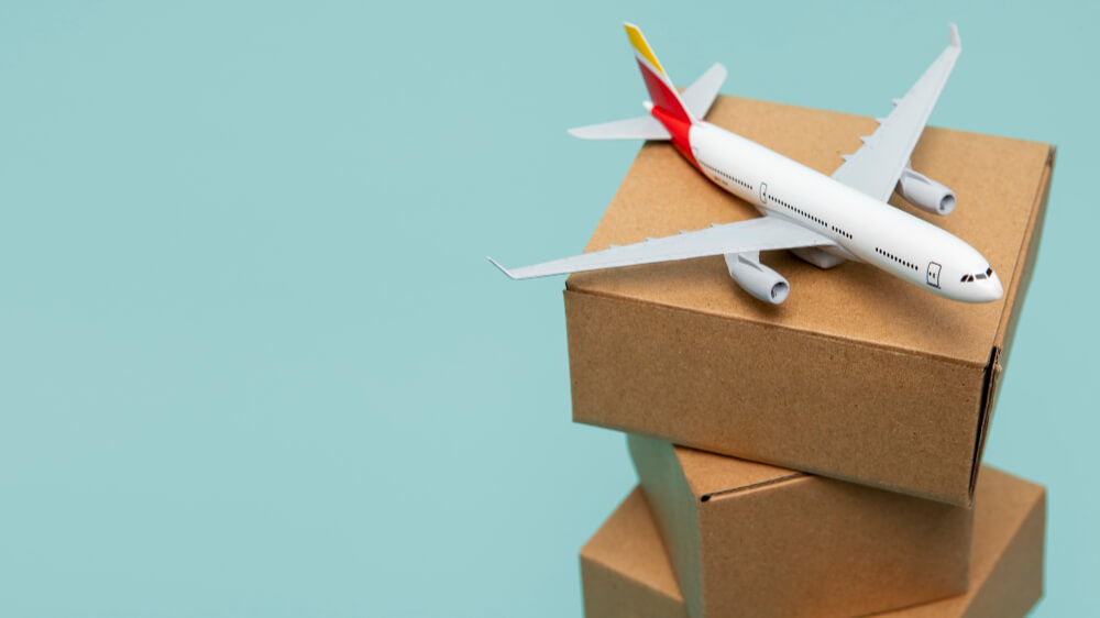 airplane on top of boxes